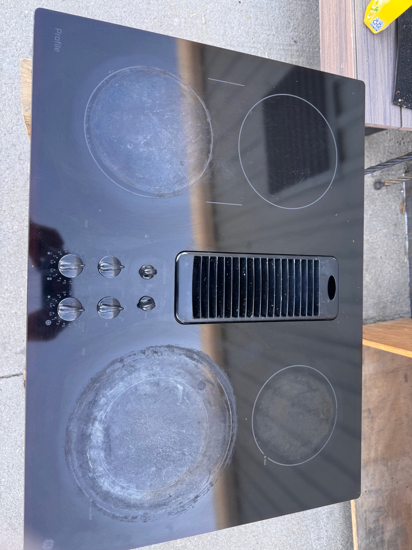 30in GE Profile Electric Downdraft Cooktop, Black