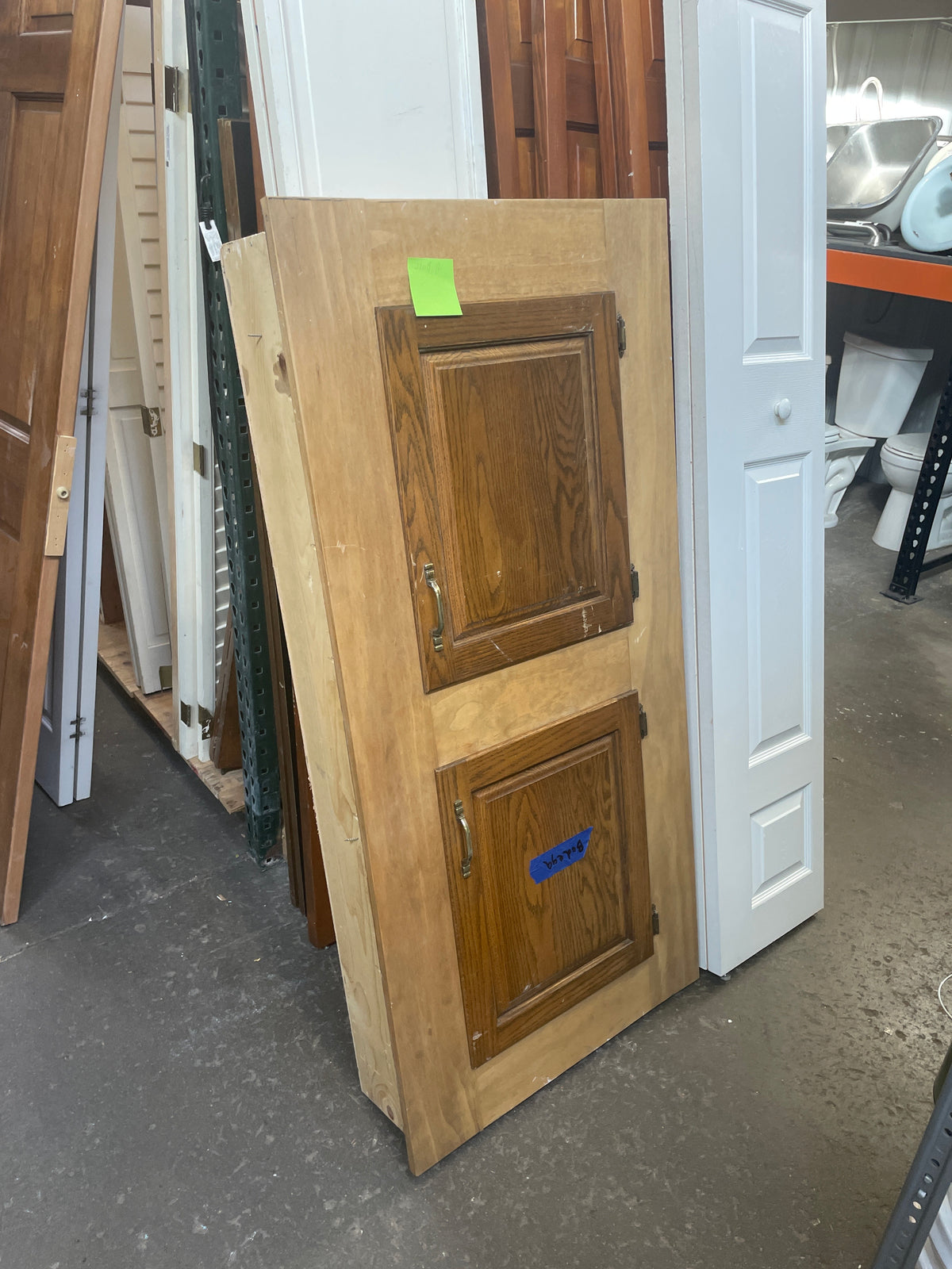 Reclaimed Wood Cupboard With Two Raised Panel Doors and Brass Pulls